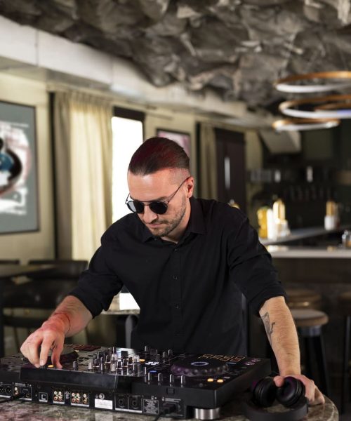male-dj-taking-care-music-entertainment-party